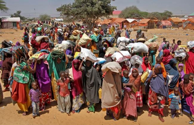 Somalis displaced by the drought, arrive at makeshift camps in the Tabelaha area on the outskirts of Mogadishu, March 30, 2017.